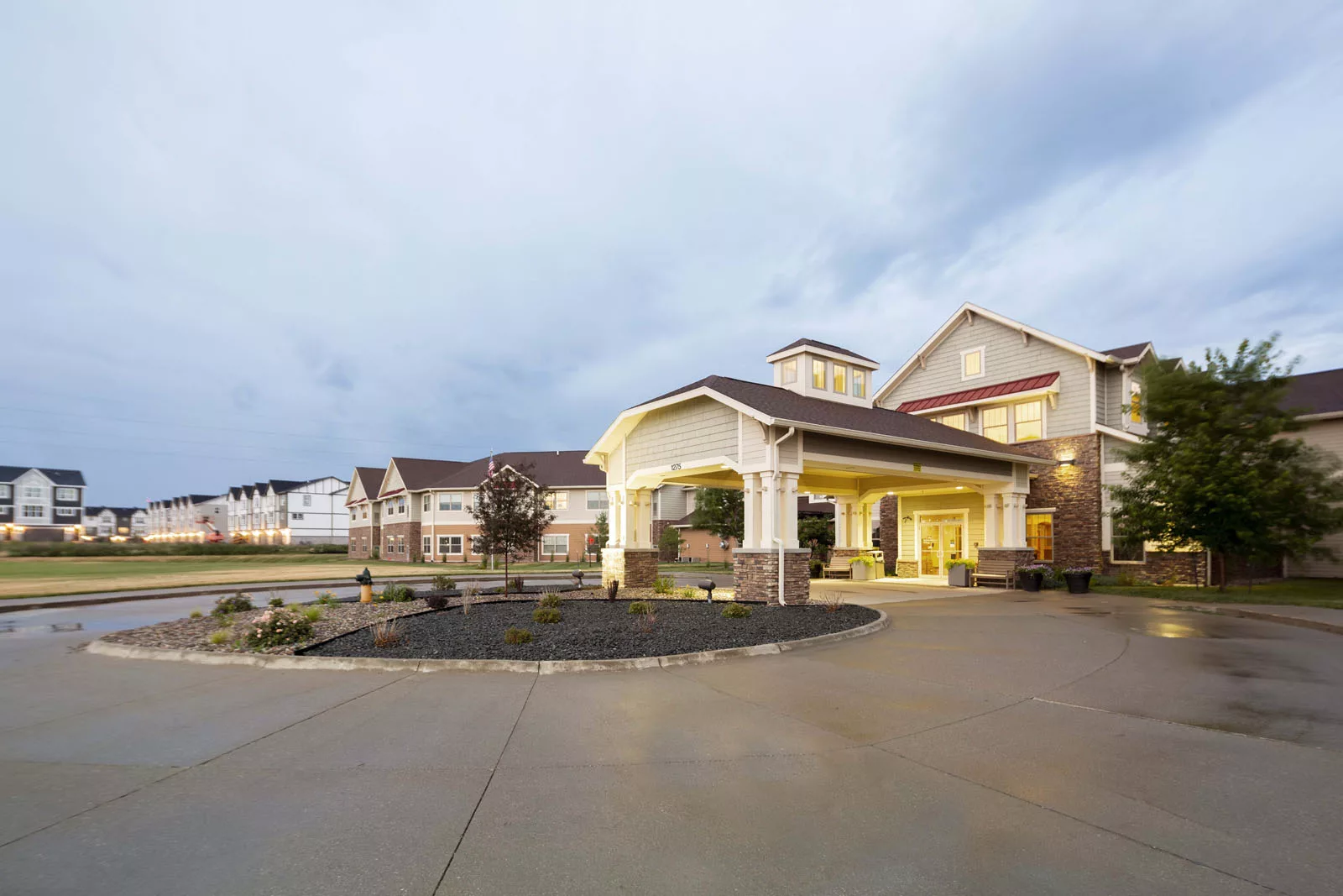 Exterior view of the facility entrance at dusk