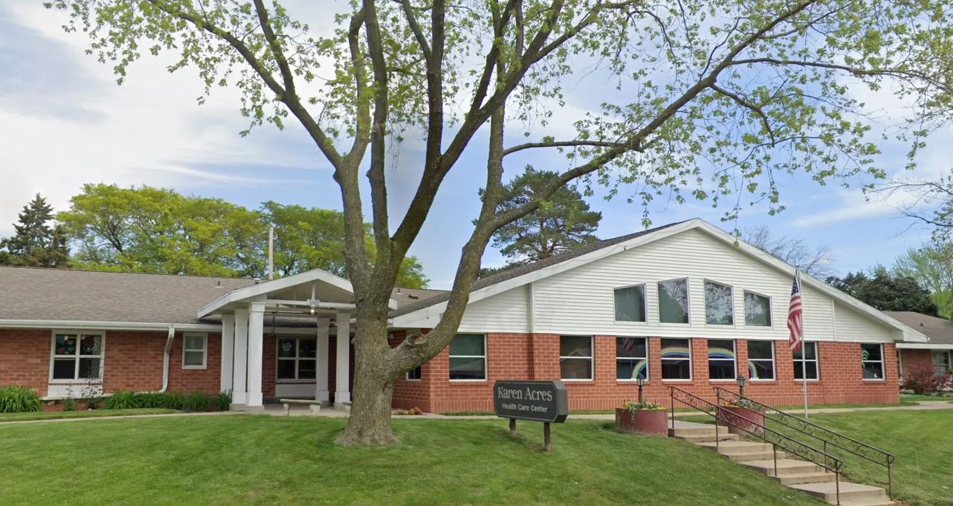 Exterior view of Karen Acres Health Care Center with landscaping