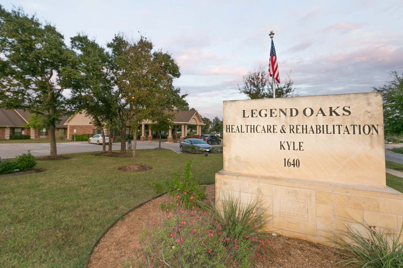 Exterior view of Legend Oaks facility with signage