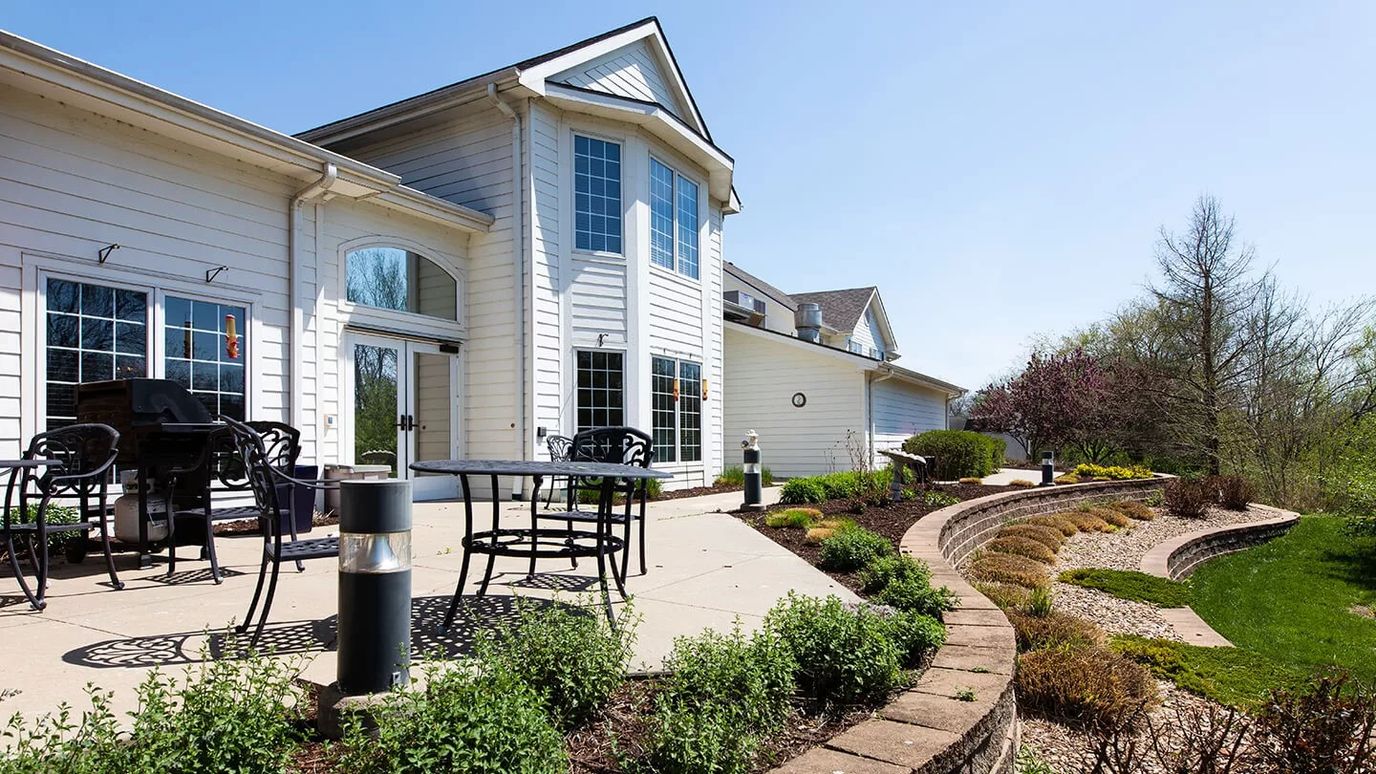 Exterior view of a patio area with seating