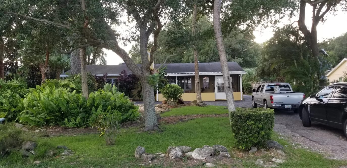Exterior view of the facility surrounded by greenery