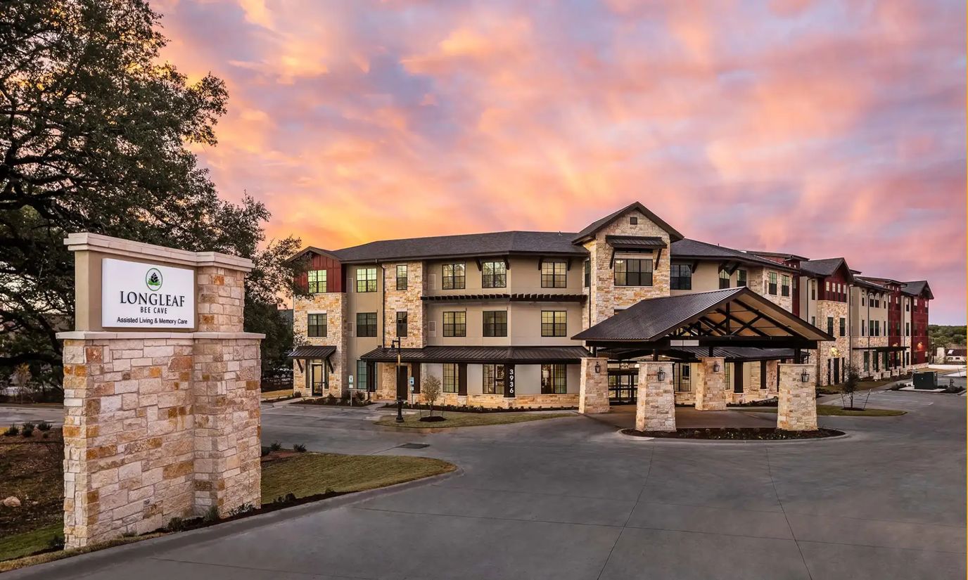 Exterior view of Longleaf facility building at sunset