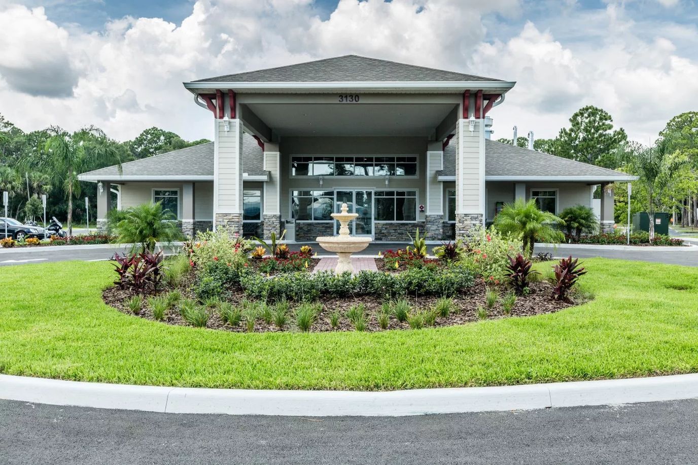 Front entrance of Majestic Gardens Living with landscaped gardens