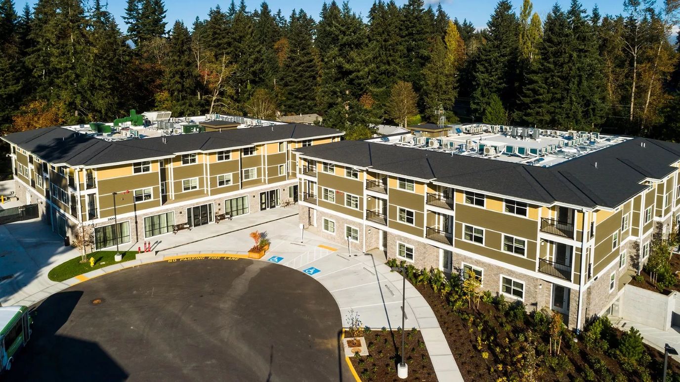 Aerial view of the Mirror Lake Village facility with surrounding nature