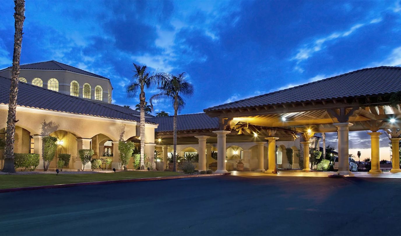 Exterior view of Park Terrace Senior Living at dusk