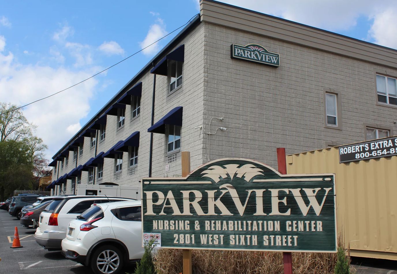 Exterior view of Parkview Nursing and Rehabilitation Center with parking lot