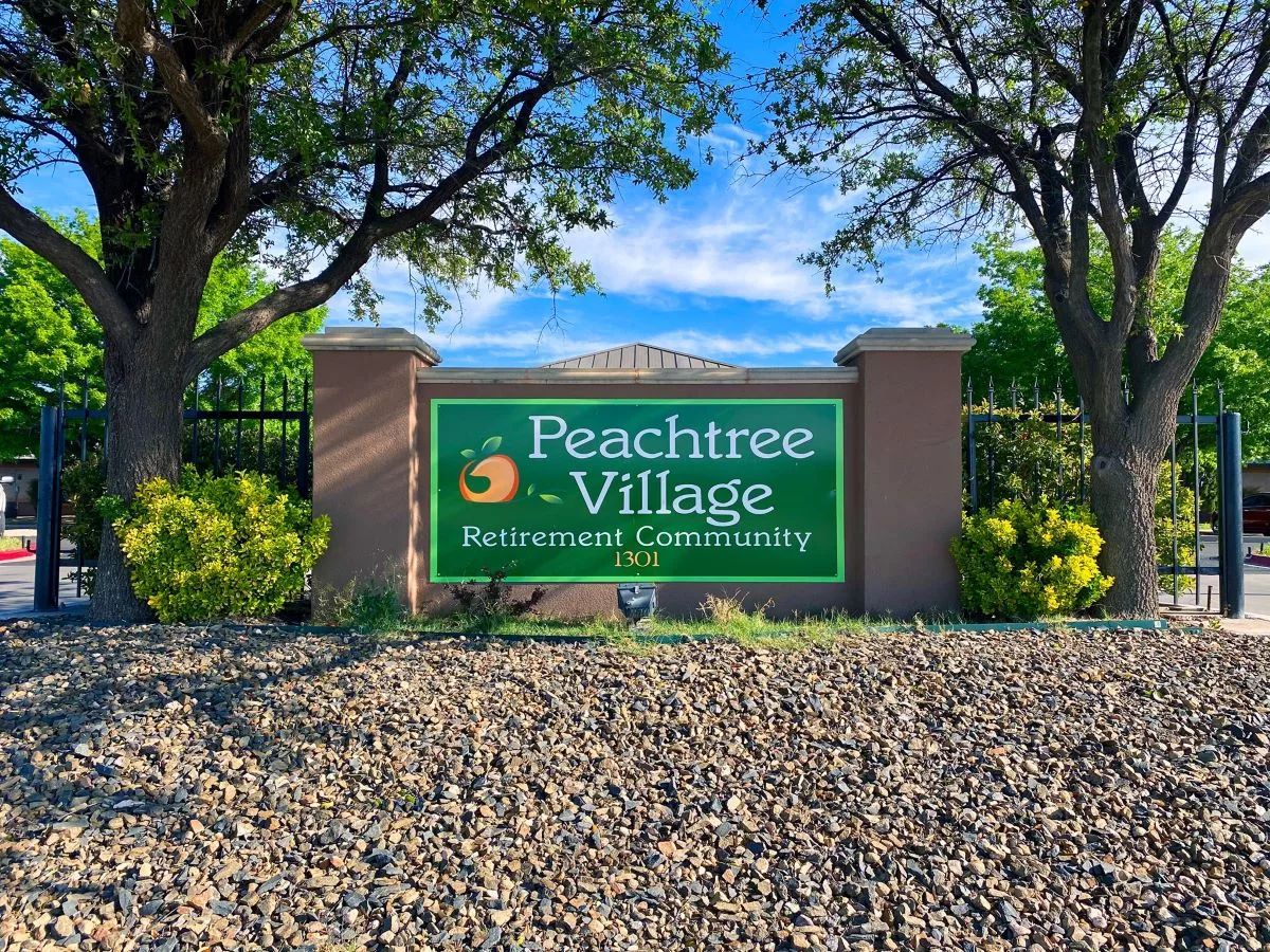 Exterior sign of Peachtree Village Retirement Community