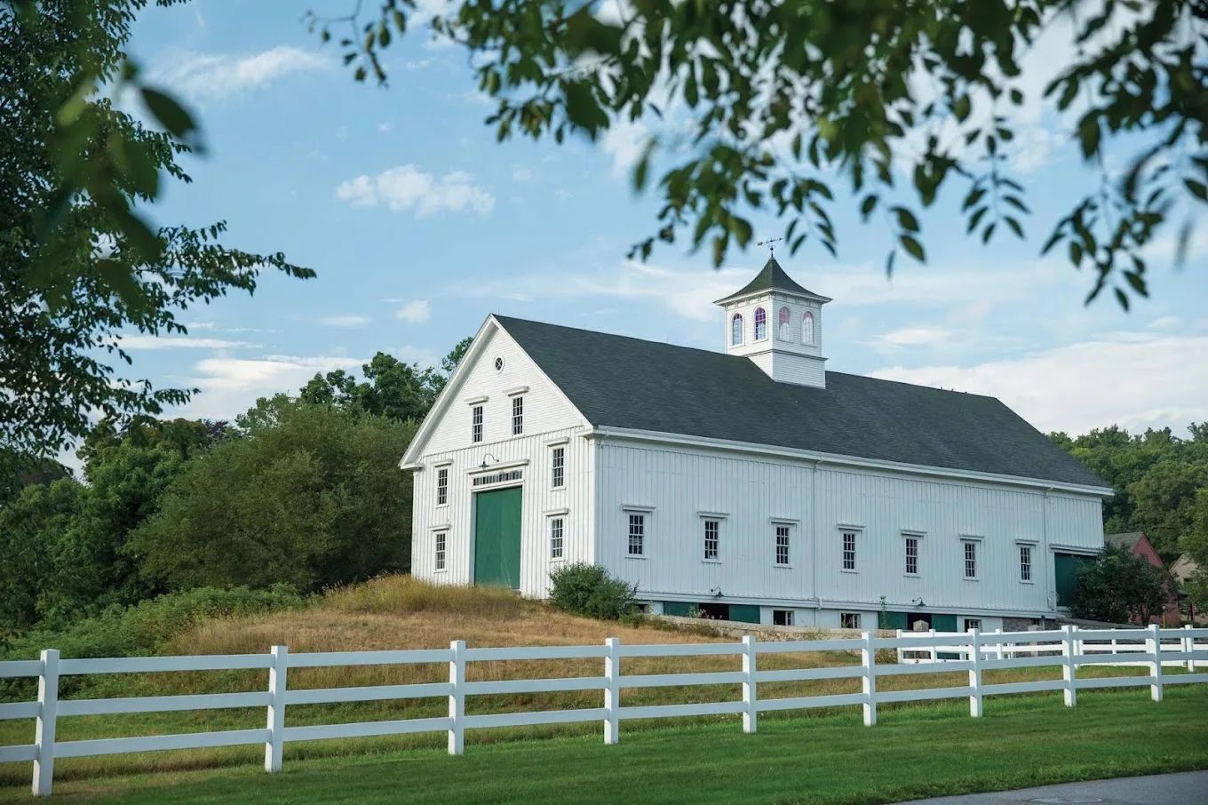 Exterior view of a white barn-like building