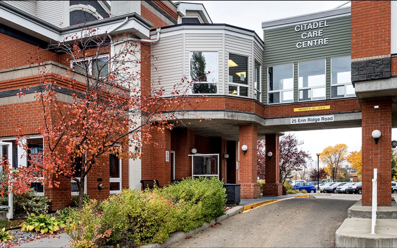 Exterior view of Citadel Care Centre with autumn foliage