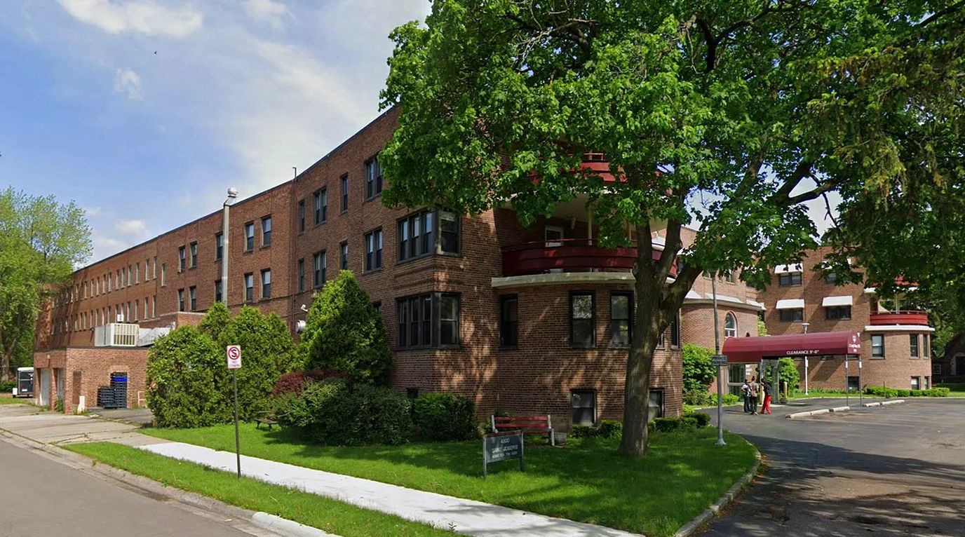 Exterior view of St Joseph's Manor with green space