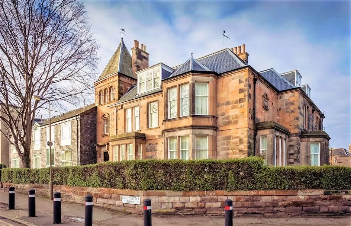 Exterior view of a historic care home building