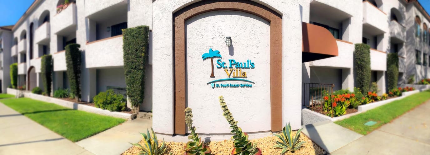 Exterior view of St. Paul's Villa facility signage