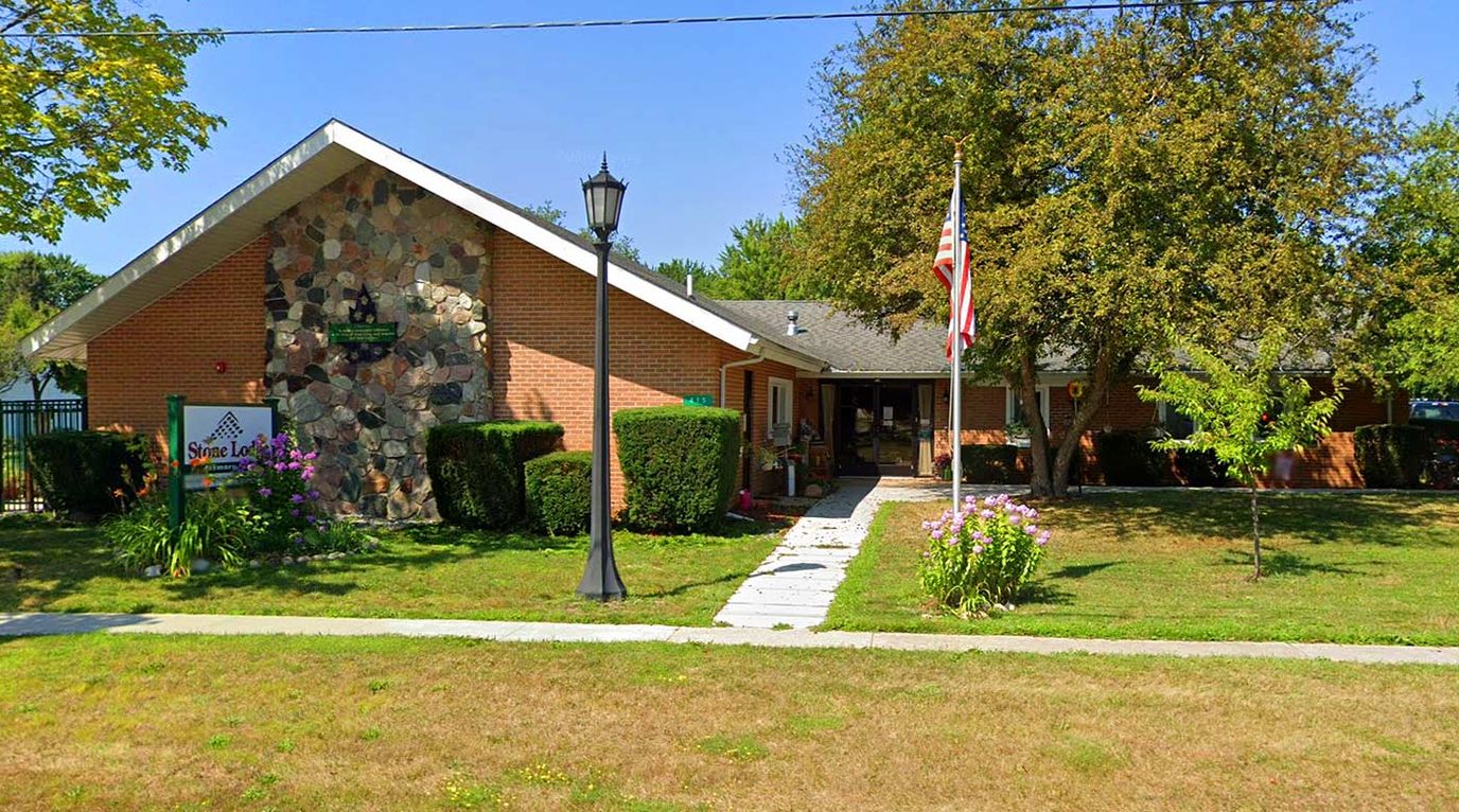 Exterior view of Stone Lodge Memory Care facility