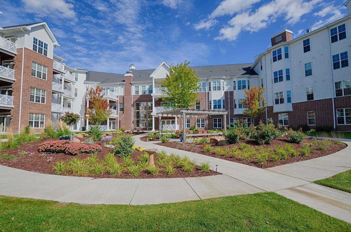 Outdoor garden area surrounded by the facility buildings