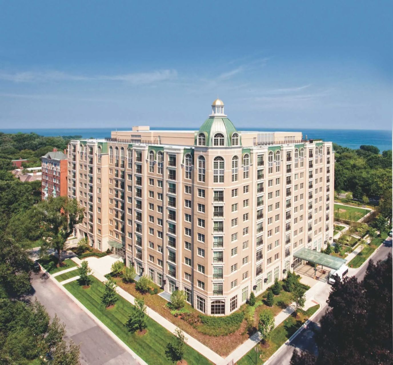Aerial view of The Mather building with landscaping