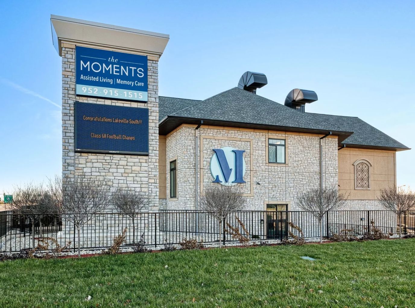 Exterior view of The Moments Memory Care facility