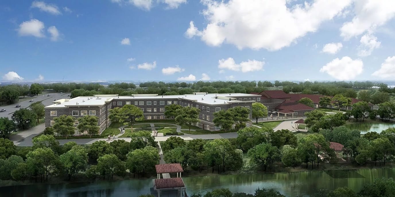 Aerial view of The Pearl Senior Living campus with greenery
