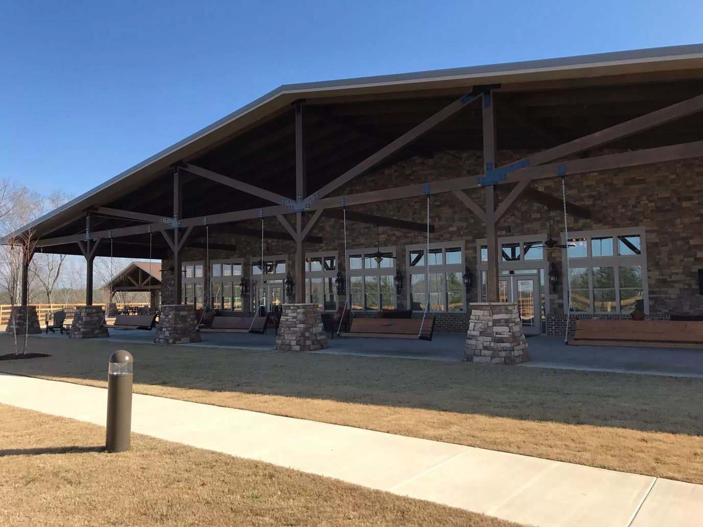Exterior view of the facility building with a large porch