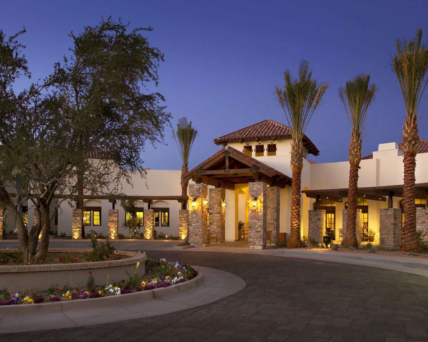 Exterior view of The Village of Ocotillo at dusk