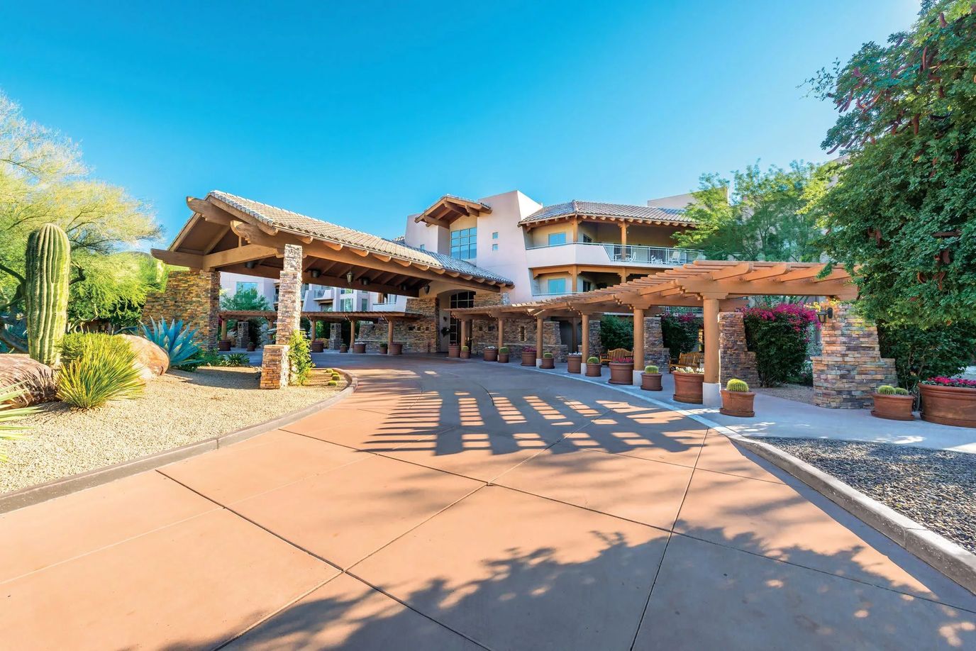 Entrance to Vi at Grayhawk with shaded walkway and landscaping