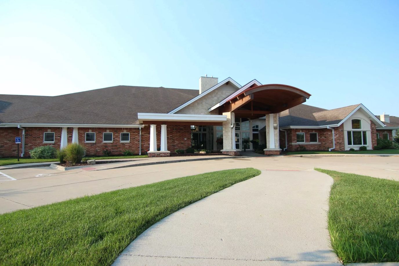 Exterior view of Woodlands Creek Senior Living entrance