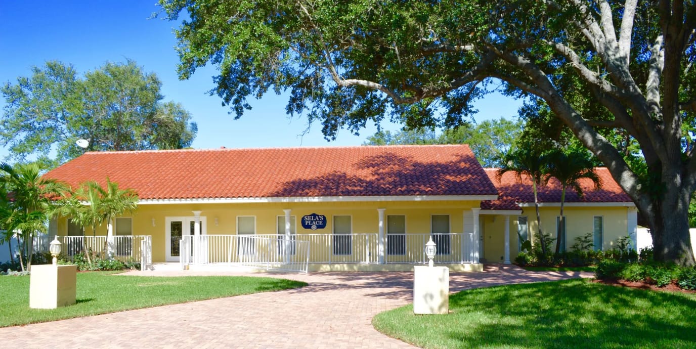 Exterior view of Sela's Place, a senior care facility