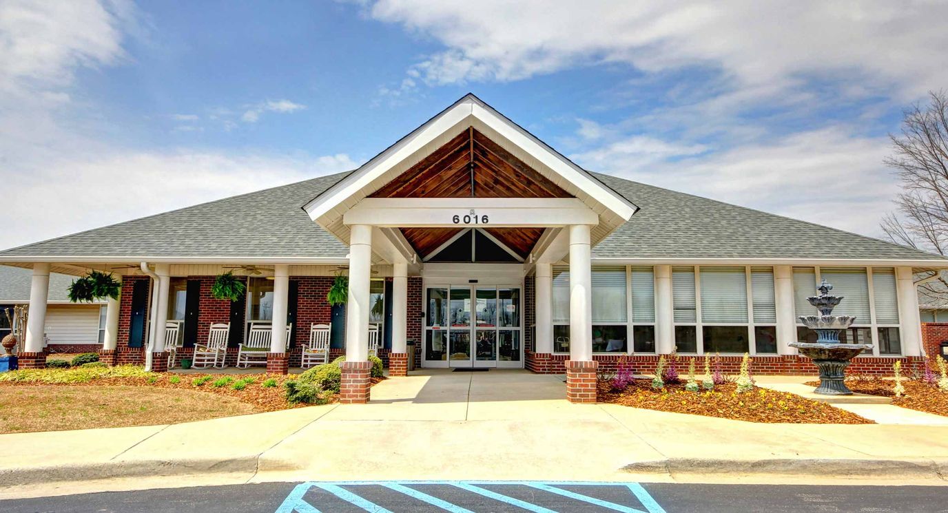 Exterior view of The Madison Village entrance and garden