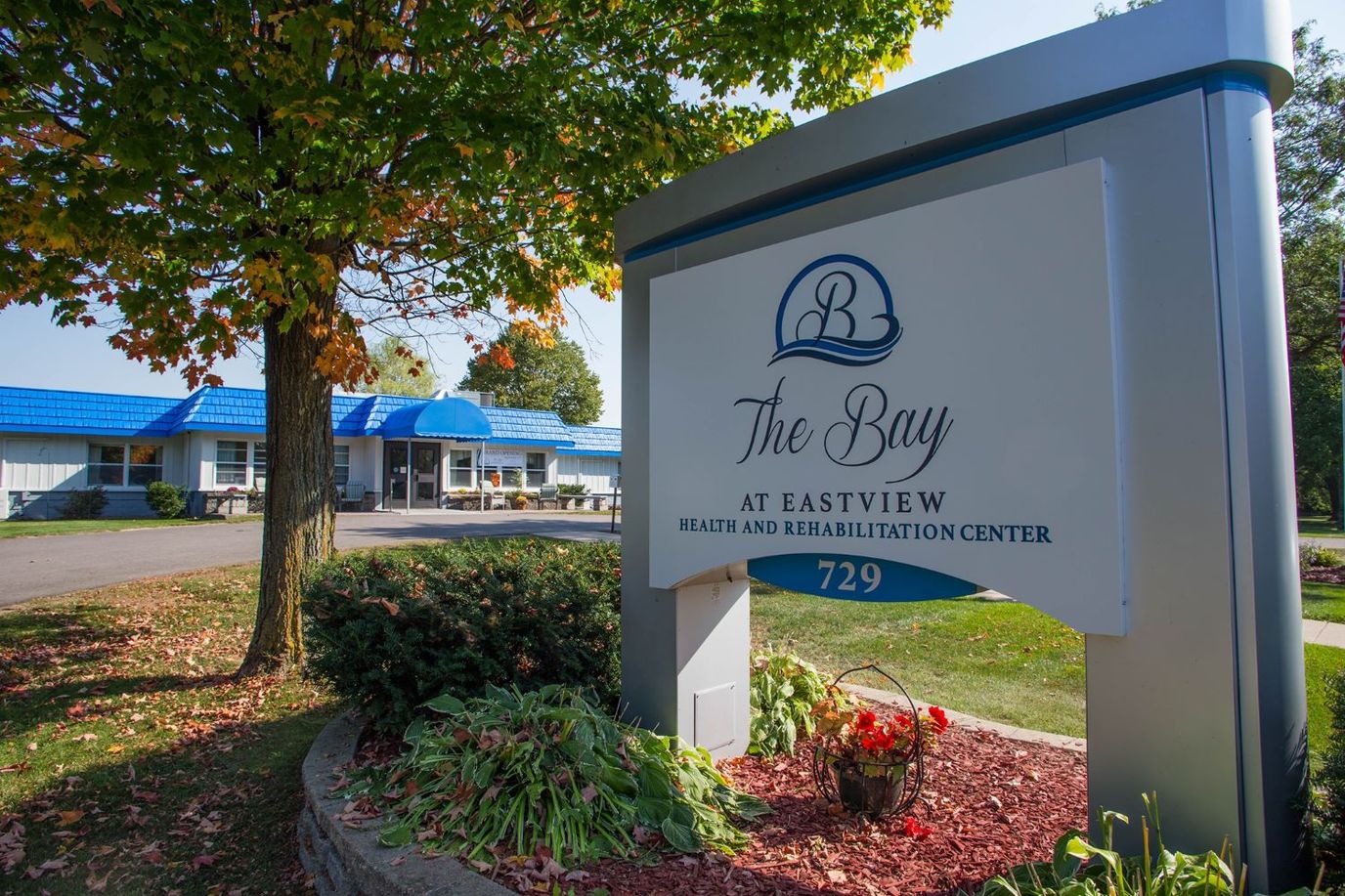 Exterior view of the facility signage and building