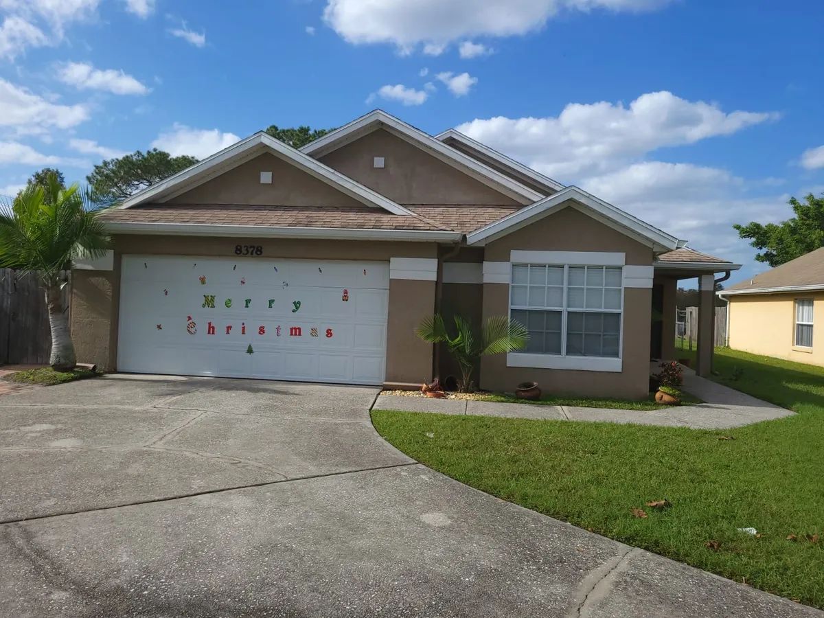 Exterior view of an assisted living facility decorated for Christmas