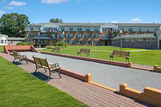 Outdoor seating area with benches in front of the building