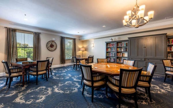 Interior common area with seating and a library