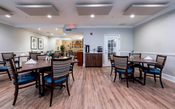 Dining room setup with tables and chairs