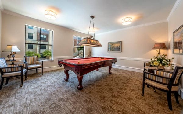 Interior common area with a billiard table