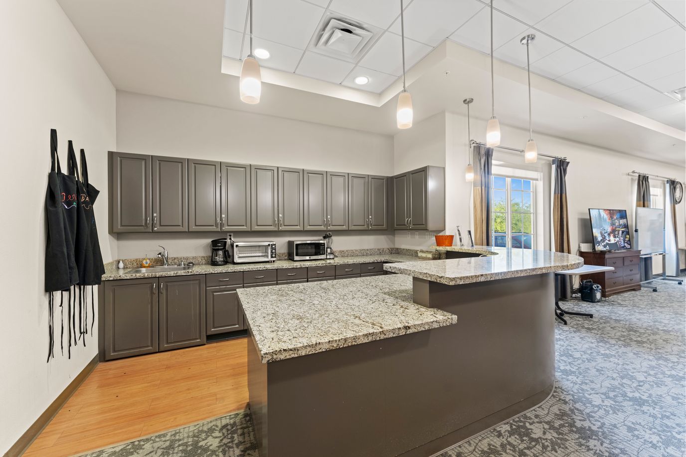 Interior kitchen area with granite countertops.