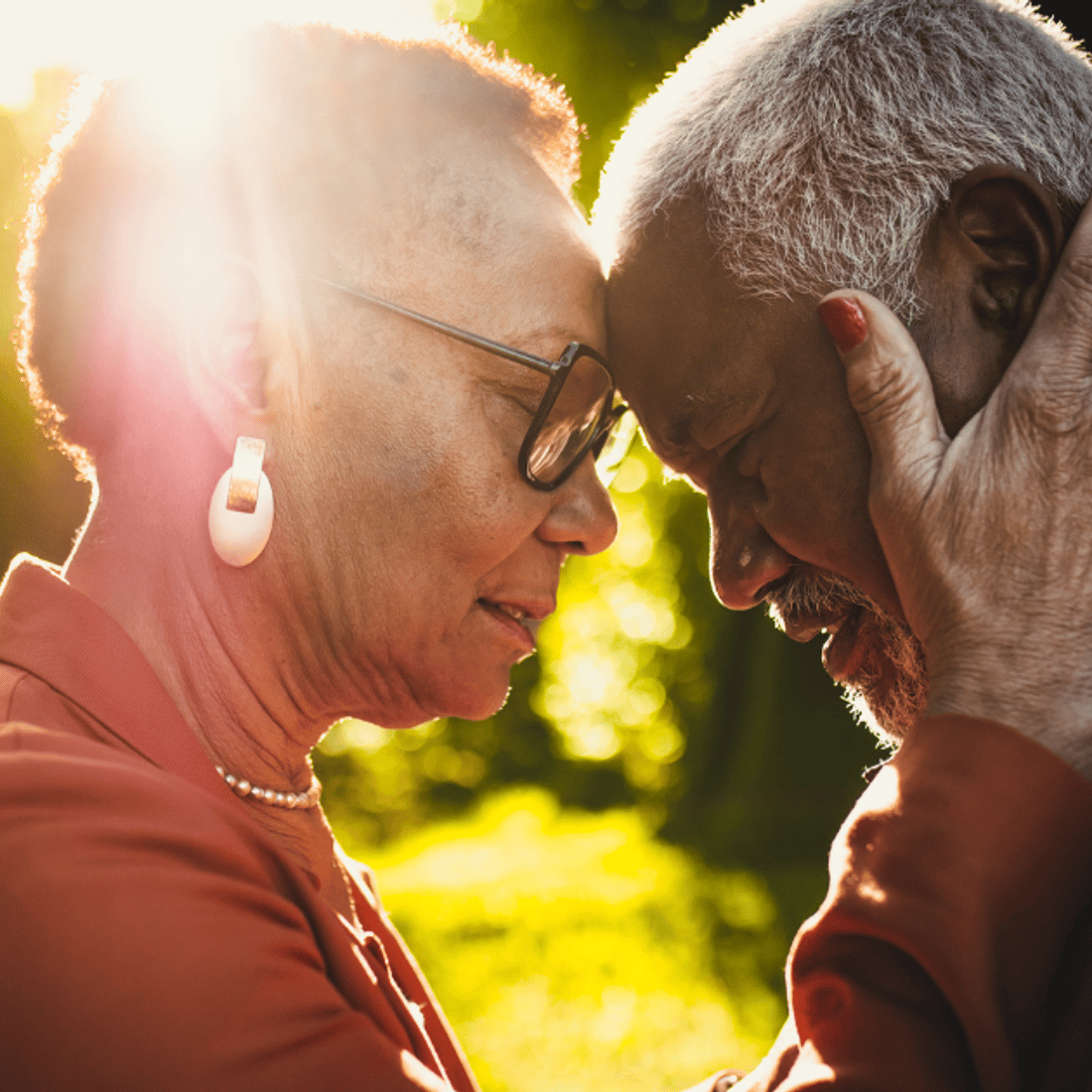 Salus Home Care, home care in San Diego, CA — Elderly couple embracing in a warm, sunlit setting