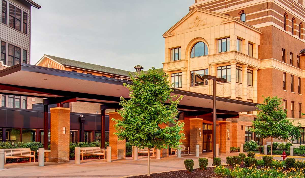The entrance of Laclede Groves facility with outdoor seating