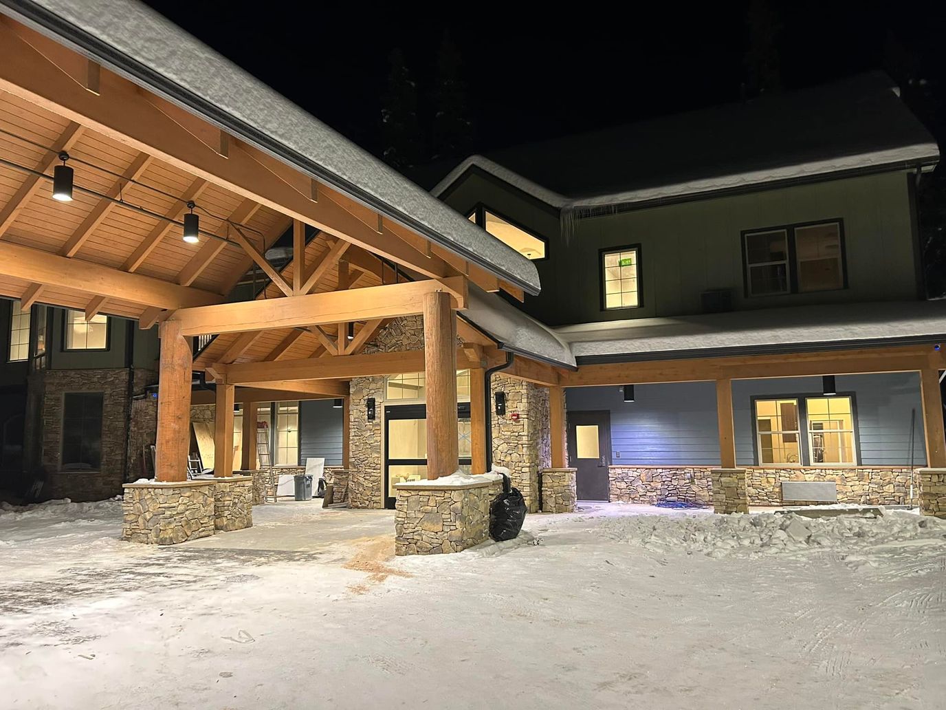 Front entrance of Timber Creek Senior Living covered in snow