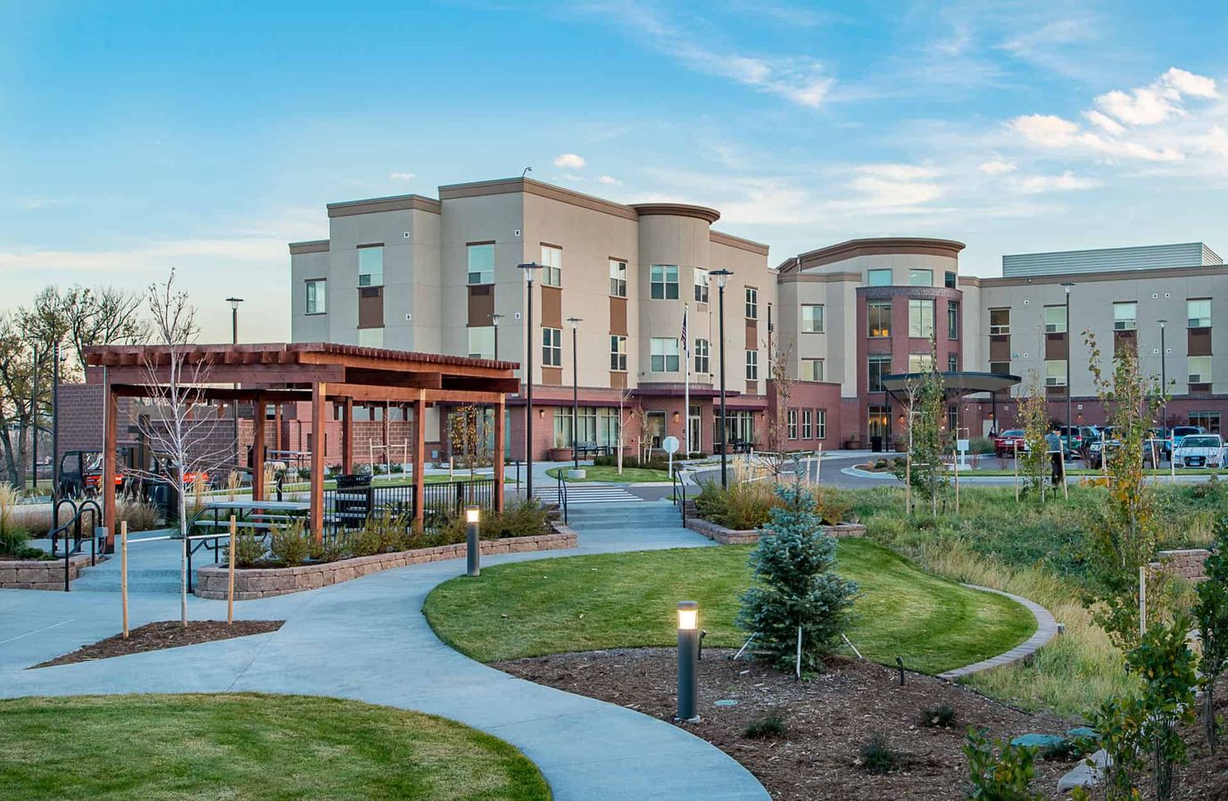 Exterior view of Village at Belmar with landscaped grounds