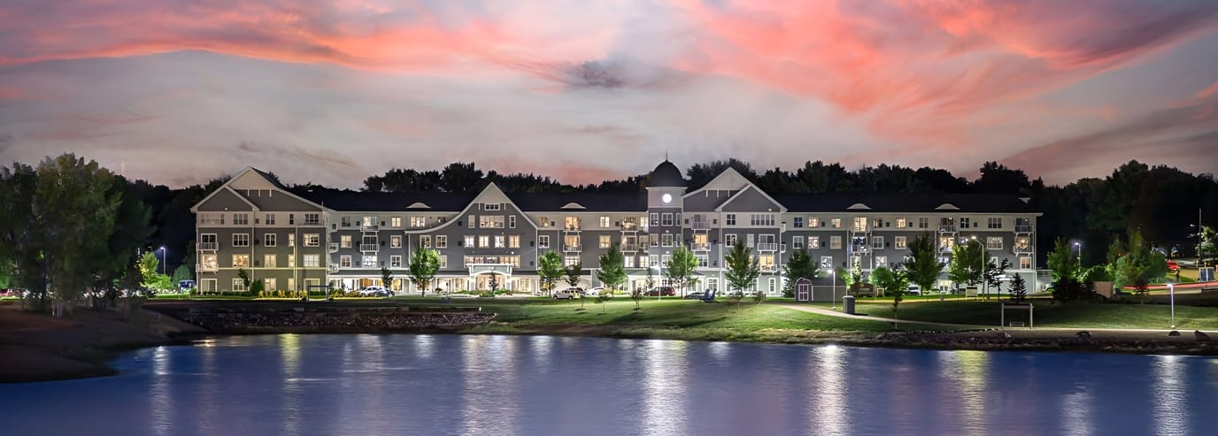 Exterior view of Legends at Lake Lorraine at sunset