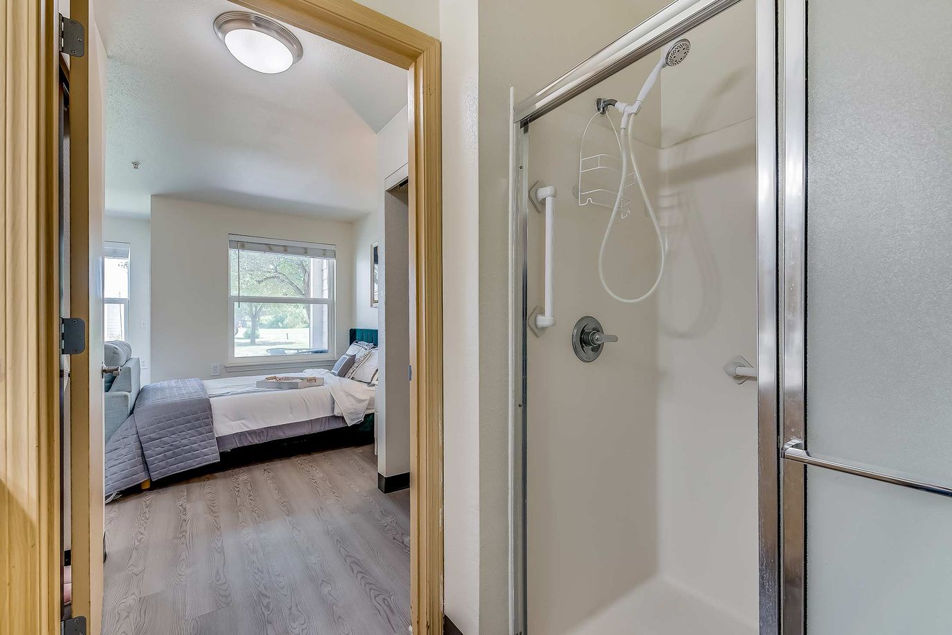 Interior view of a resident's room with a shower