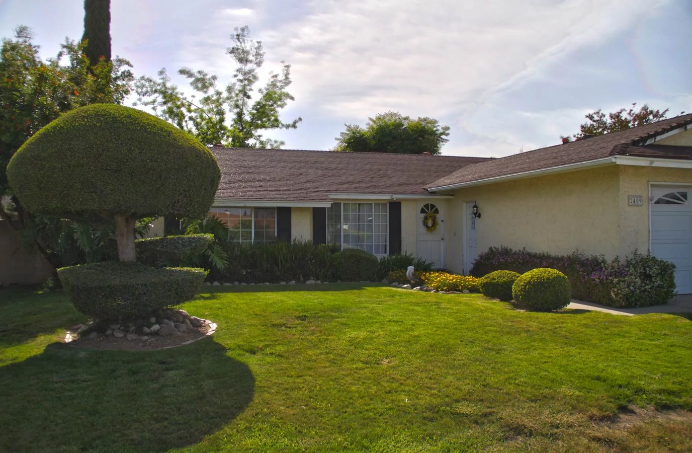 Exterior view of a well-maintained assisted living facility