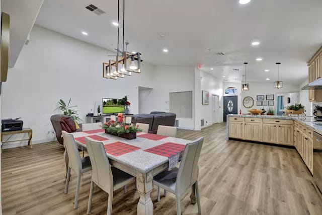 Interior view of a bright common area with dining table