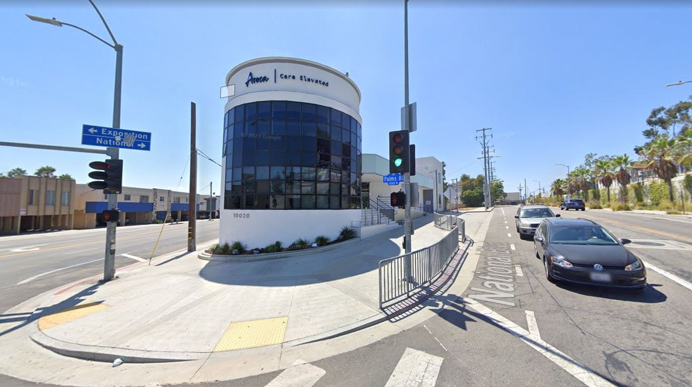 Exterior view of Arosa facility on a sunny day