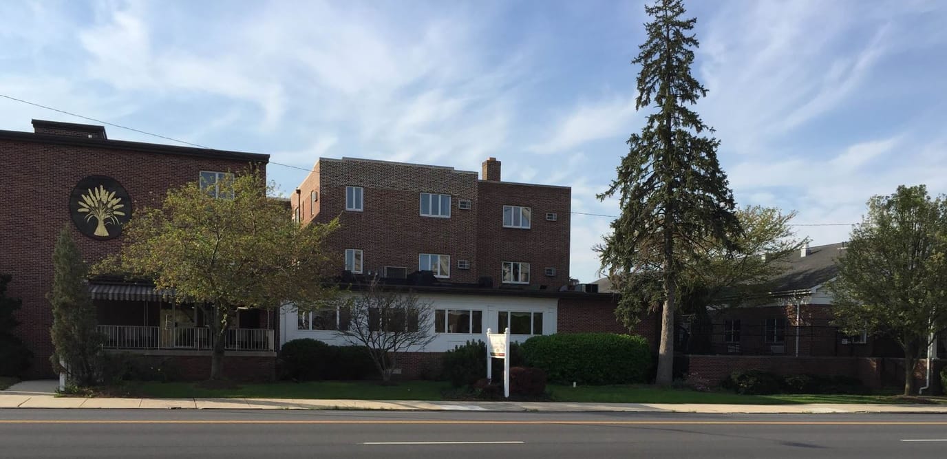 Building exterior of Autumn House West with landscaping