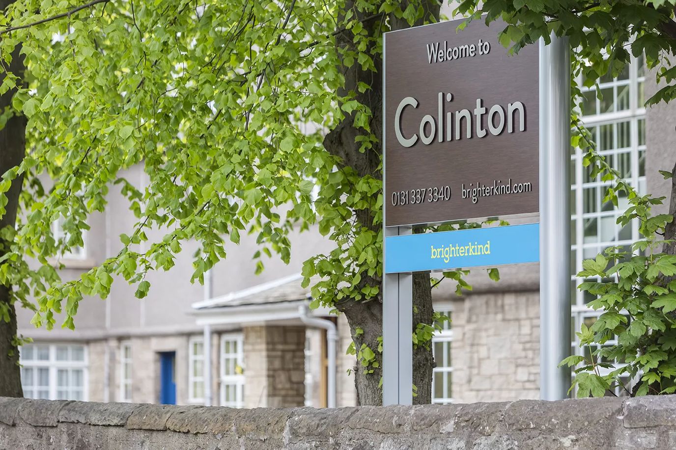 Signage showing the facility name outside