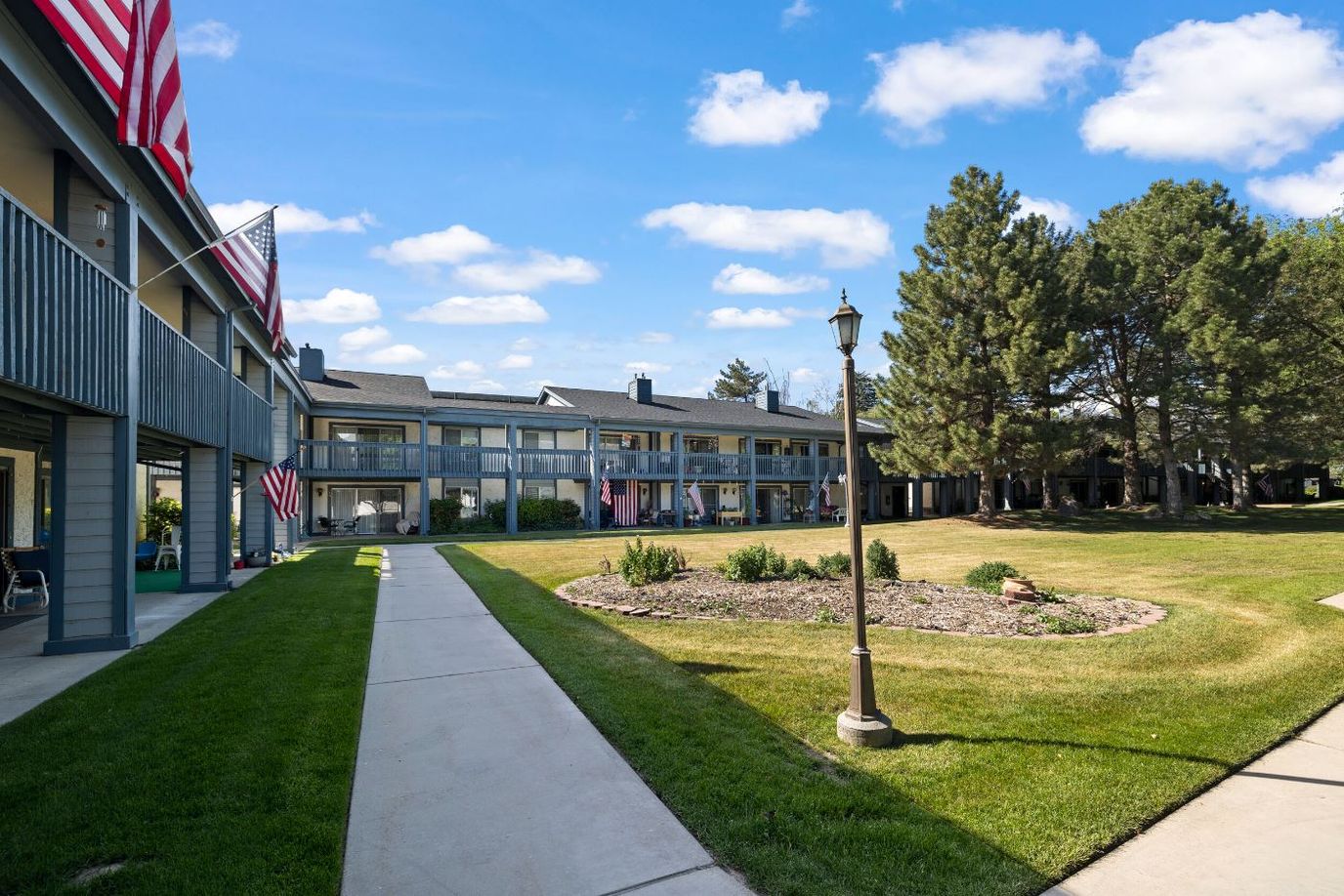 Exterior view of the retirement facility with landscaped gardens