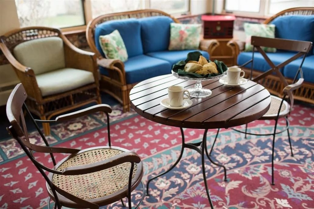 Intimate lounge space with seating and refreshments