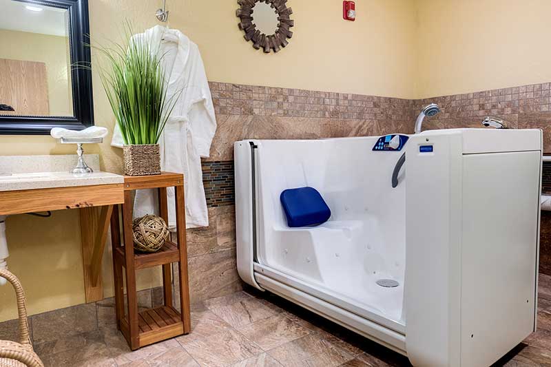 Accessible bathtub in a senior living facility bathroom