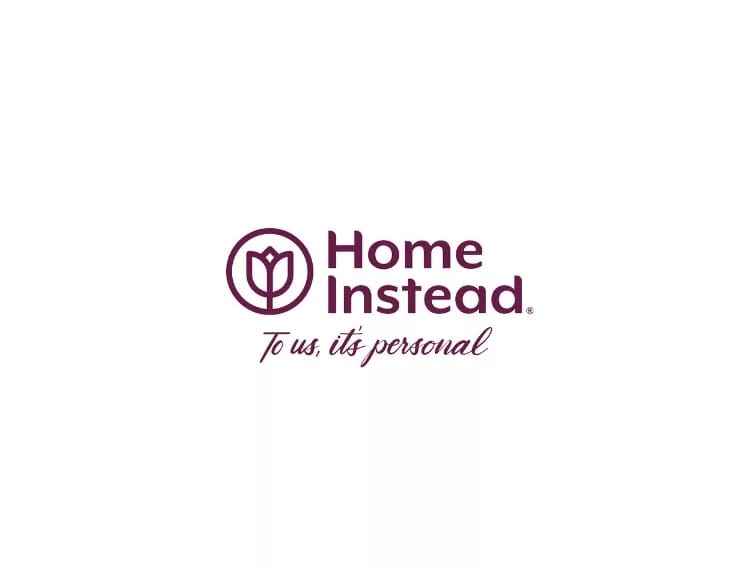 Home Instead logo with a floral design