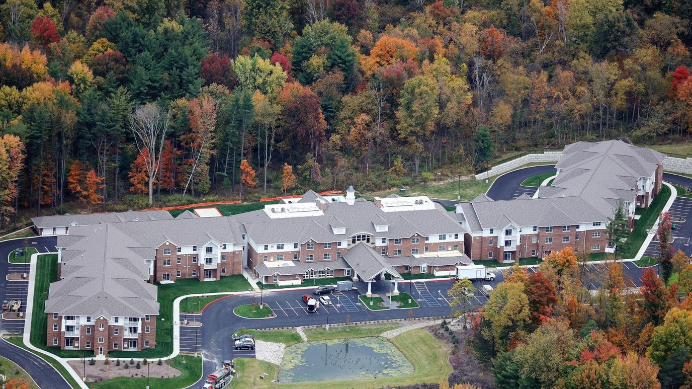 Aerial view of Hudson Meadows Retirement Community surrounded by trees